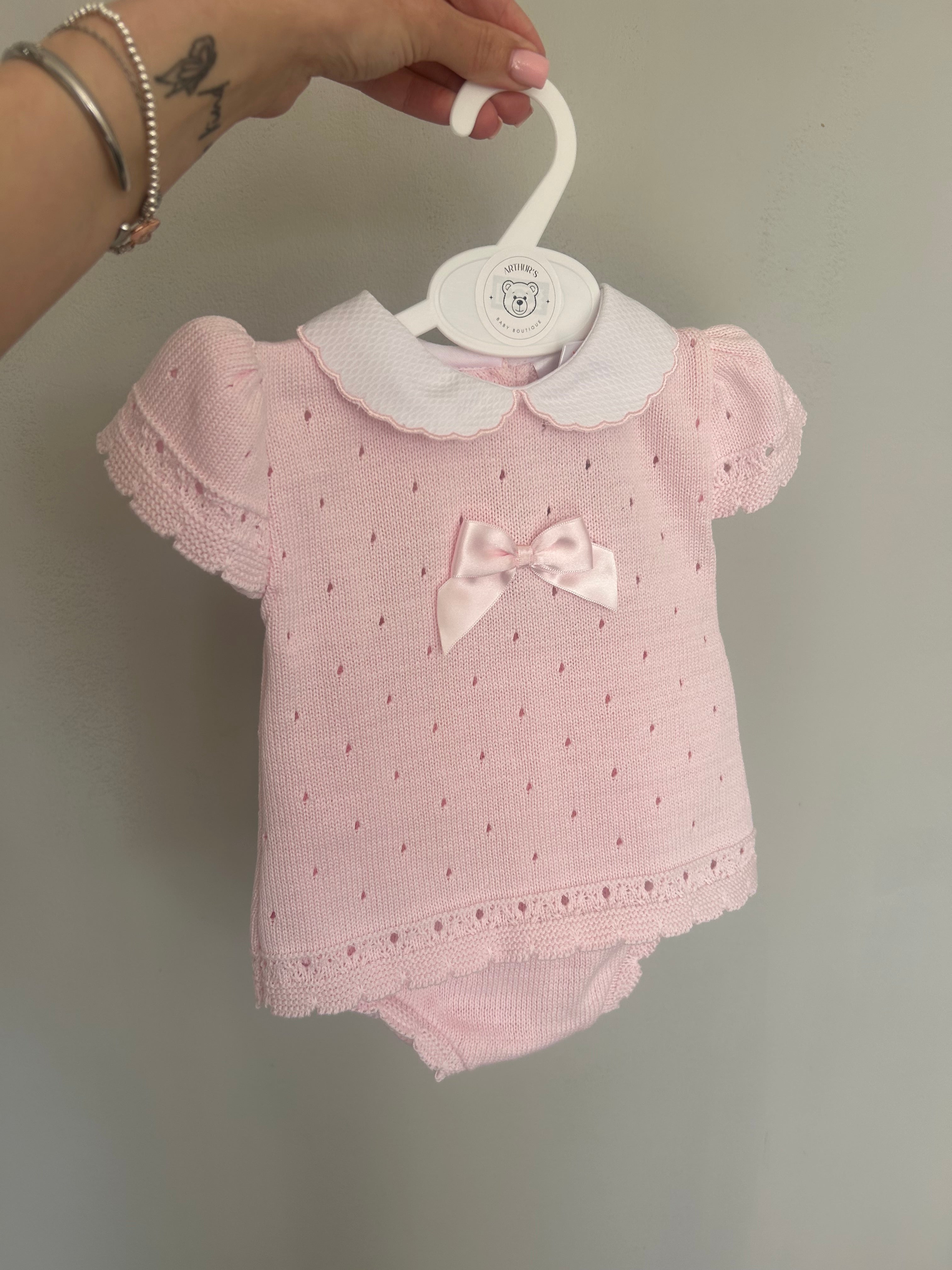 Pink Suit With Bow Detailing
